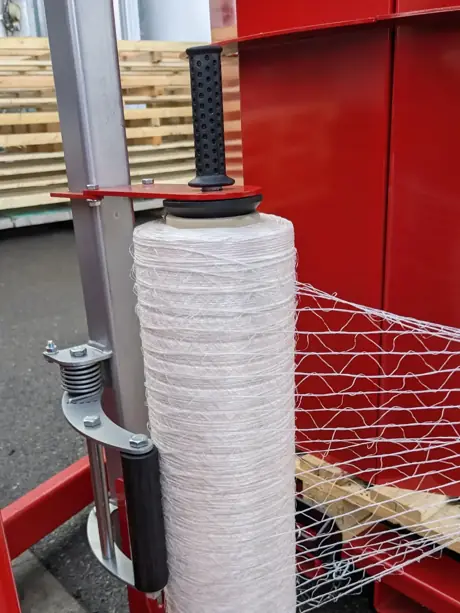 Support de filet pour palettiseur de bûches