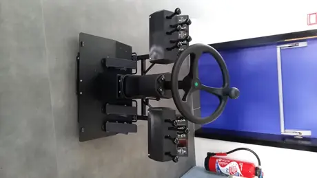 Poste de conduite pour simulateur de niveleuse