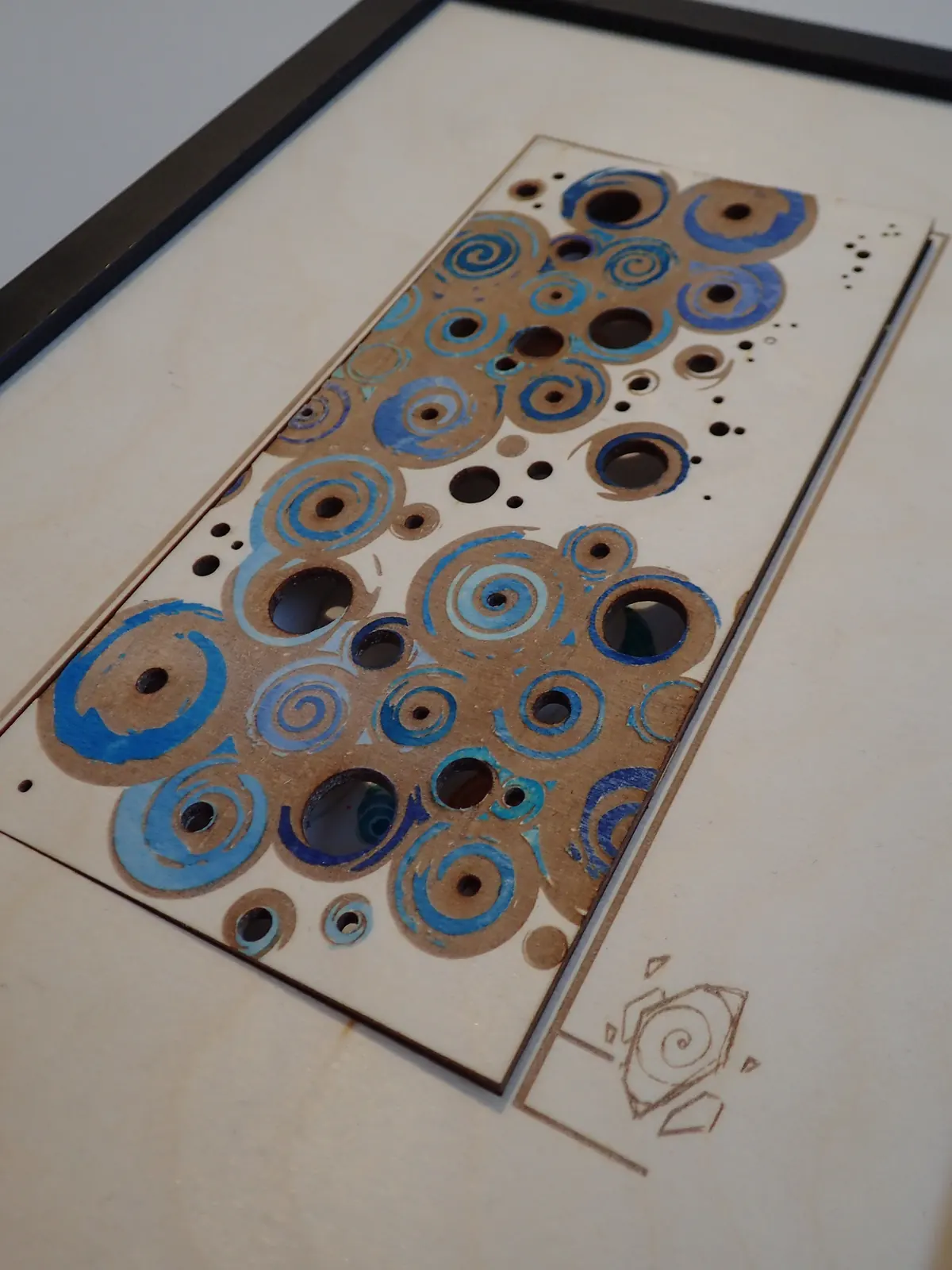 Laser-engraved frames for a watercolour exhibition